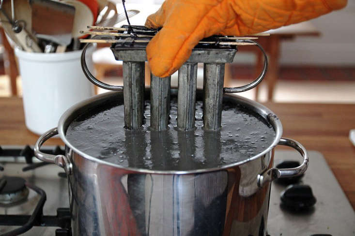 With the candles stuck in the molds, I tried the boiling water method.